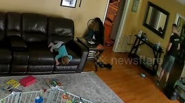 Baby Reaching for Book Requires Dad Reflexes - 2 angles with Slow Motion