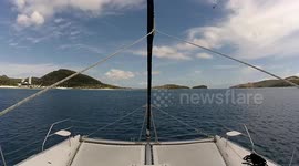 Calm Sail Footage arriving at the Hamilton Island Marina with passing Helicopter