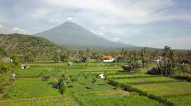 2.7K Aerial View over Ricefields and Mount Agung from Amed (Bali, Indonesia)