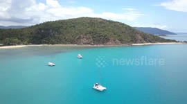 2.7K Aerial View of the anchorage with Sailboats at South and Mid Molle Island