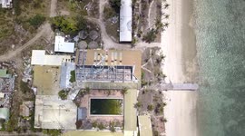 2.7K Aerial View from above Main Building Pool Abandoned South Molle Resort