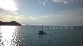 Drone Aerial View towards Catamaran Cid Harbour Sunset time (Whitsunday Island)