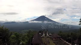 4K Bali Timelapse of Mount Agung smoking view from Pura Lempuyang Temple