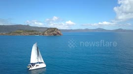 2.7K Drone Aerial View towards Sailing Catamaran Boat at the Whitsunday Islands