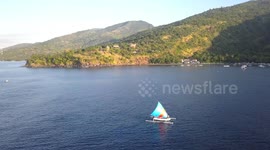 2.7k Slow Aerial View of a traditional Fishing Boat Jukung in Bali Indonesia