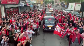 Rowdy Benfica FC fans surround London Bus