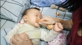 How to make a baby laughing while cleaning their teeth