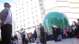 Couples perform the traditional chotis dance in Madrid