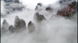 Spectacular drone footage of clouds in mountains in southern China