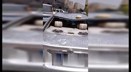 Powerful winds rip off building walls in north China, injuring one