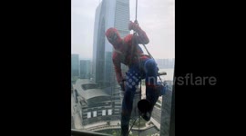 'Spiderman' spotted washing windows out of tall building in China