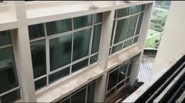Window panes shatter as furniture is blown off by the winds during cyclone Fani in Odisha, India