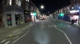 Car reverses into my bicycle then stops when I bang on it.