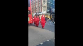 Extinction Rebellion performers make their way to closing ceremony at Marble Arch