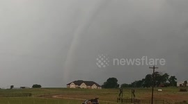 Powerful tornado tears through Oklahoma fields