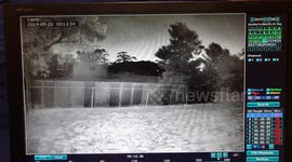 CCTV footage shows mysterious lights illuminating the night sky