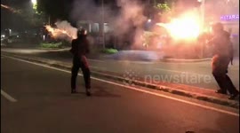 Moment tear gas is fired at protesters during Indonesia post-election riots