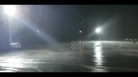 Oklahoma rainstorm that flooded town seen lashing parking lot