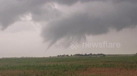Tornado weakens as it rips through fields in Texas