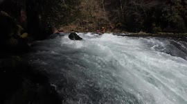 Kayaker goes down waterfall