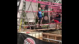 Amputee finishing Tough Mudder obstacle
