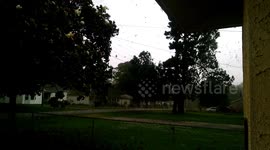 Arkansas mother captures the terrifying moment tornado rips apart her neighbourhood