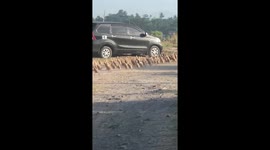 Massive flock of running ducks stop traffic in Bali, Indonesia