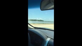 Tractor driving on water