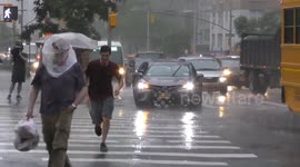 New Yorkers caught off guard by sudden downpour