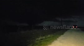Storm Chasers capture Large and Violent tornado, as it carves a path towards Lavern, OK