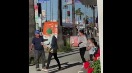 Justin Bieber gives homeless man in Hollywood $500 during selfies with young fans