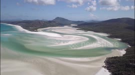 Drone footage showcases the stunning scenery at Whitehaven Beach in Australia