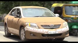 Dung-covered car keeps cool in the scorching heat, Gujarat India