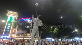 Performing man balances with swords! extremely dangerous and make the audience see suspense, hold their breath