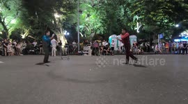 Funny performance! Undressing while juggling of two men on the walking street
