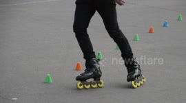 Slaloms with roller at the Louvre Museum. Paris.27 may 2019