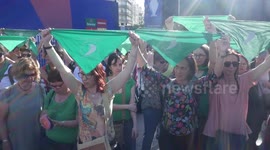 Women in Madrid protest for legal, safe and free abortion in Argentina.