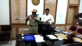 Indian cop wins hearts by turning his baton into a flute