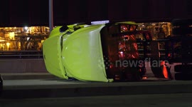 Overturned semi-truck blocks bridge near Los Angeles