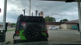Tornado sirens wail as a storm chasers prepare in Beloit Kansas, USA