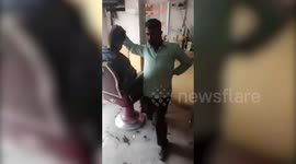 Fancy a head massage with a twist? Enter the dancing barber from northeast India