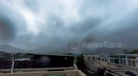 Hurricane Typhoon Mangkhut sends clouds and rain over Hong Kong's tallest peak Tai Mo Shan