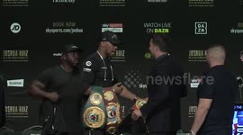 Heavyweight champ Anthony Joshua lets Andy Ruiz HOLD his belts!