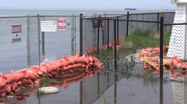 Sandbags fail to stop flooding as Canada's highest water level continues to rise
