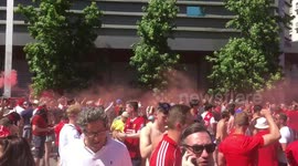 Liverpool fans await the final game of the of Champions League in Madrid