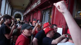 Liverpool fans celebrate first goal in Madrid’s Plaza Mayor