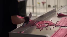 Sweet-maker cuts rock candy at high speed with robotic precision