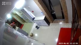 Elevator doors in Chinese apartment suddenly crash open after stone gets stuck inside