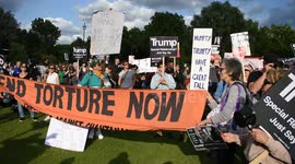 Anti-Trump protesters gather outside Buckingham Palace