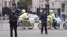 Protesters boo as Trump's motorcade departs Downing Street